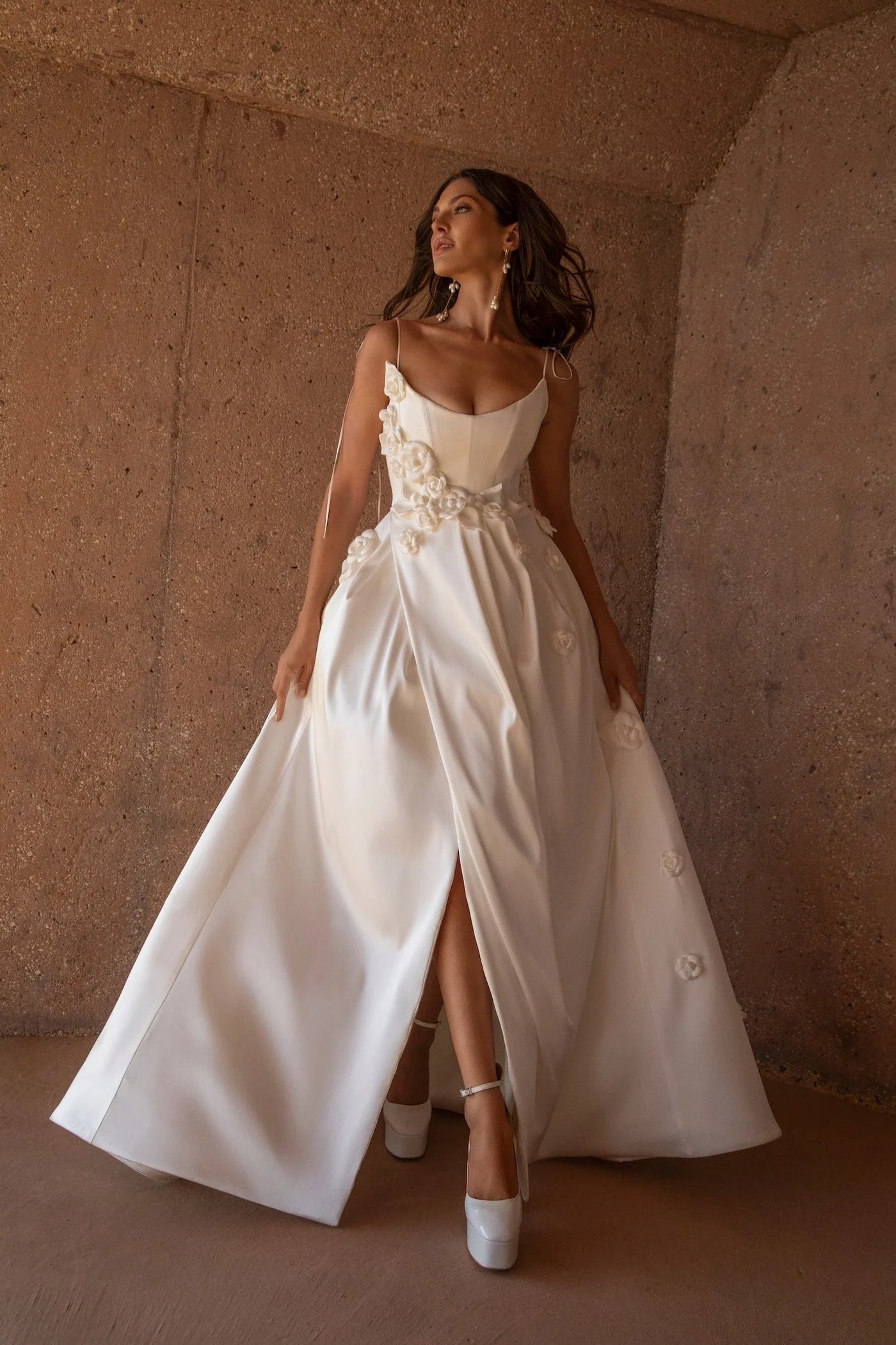 elise satin wedding dress The Elise. Crafted from luminous silk duchess satin, Elise pairs a sculpted  cupped corset with a dramatic full skirt, creating a silhouette that feels  both regal and modern. Hand-beaded crystal and cascading